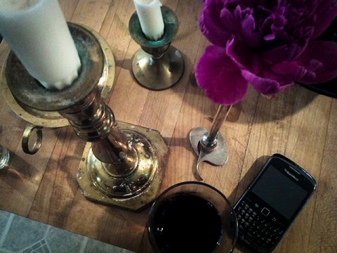 still life with cabernet, peonies, candles and blackberry