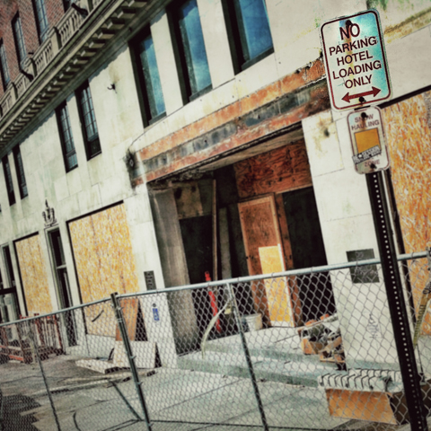 same sign. different day. the old eastland hotel. portland, maine.