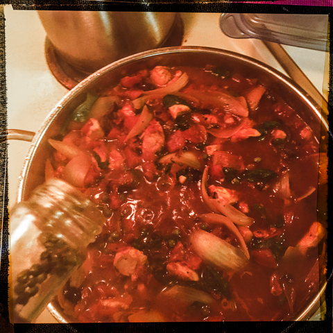 2 chicken breasts, 1 medium onion, 4 garlic cloves, 1 cup pitted and chopped kalamata olives, 2 cans diced tomatos, 1 small can tomato sauce, pinch of salt, dried oregano, basil, baby spinach... capers! Serve over penne. Sprinkle with feta..